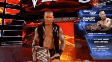 randy orton is holding a wwe championship belt in his hands