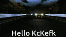 a toyota car is driving down a highway with the words hello kckefk above it