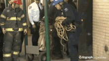 A Metal Object, Believed To Belong To A Jet Used In The Sept. 11 Attacks, Was Removed From An Alley. GIF - GIFs
