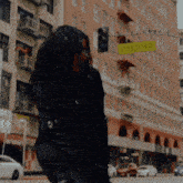 a ped king sign is hanging from a traffic light