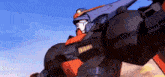 a close up of a robot with a blue sky in the background