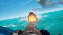 a video game shows a cannon firing a bullet in the ocean