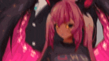 a girl with pink hair is wearing a t-shirt that says ' mc ' on it