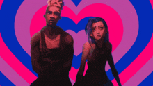 a man and a woman holding hands in front of a pink and blue heart