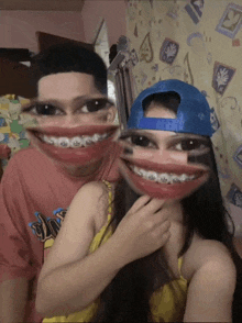 a man and a woman are posing for a picture and the woman is wearing braces and a blue hat