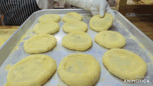 a tray of bread is being made in an animatica video