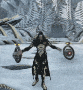 a video game character is standing in the snow holding a ring