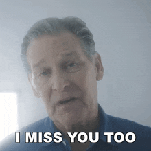 an older man says " i miss you too " in front of a mirror