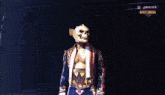 a wrestler wearing a skull mask and a wrestling belt is walking down a hallway .