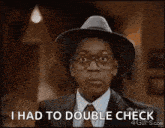 a young man wearing a hat and glasses is saying `` i had to double check `` .
