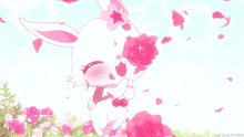 a white rabbit with a pink flower on its head