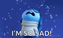 a blue cartoon character is crying and saying `` i 'm so sad '' .
