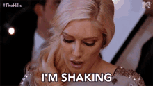 a blonde woman says i 'm shaking in front of a man