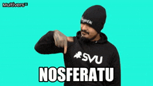 a man wearing a black hoodie and a black beanie says " nosferatu "
