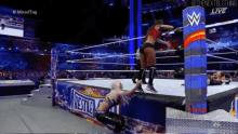 a wrestling match is being shown live on the wrestlemania website