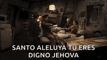 a group of people sitting around a table with the words " santo aleluya tu eres digno jehova " on the bottom