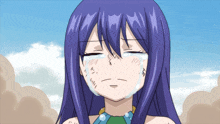 a girl with purple hair is crying with tears on her face