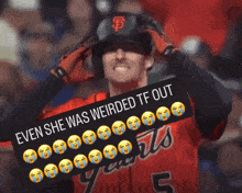 a giants baseball player holds a sign that says " even she was weirded tf out "