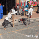 Street Performance Viralhog GIF - Street Performance Viralhog Pass Through A Ring GIFs