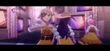a group of anime girls are standing next to each other in a room with a lot of screens .