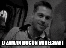 a black and white photo of a man with the words o zaman bugun minecraft written below him