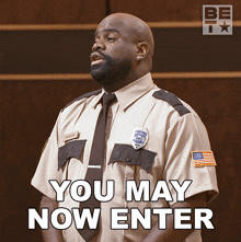 a security guard says you may now enter