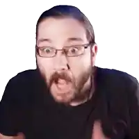 a man with glasses and a beard making a funny face