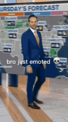 a man in a suit and tie is dancing in front of a weather forecast screen