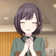 a girl with purple hair is smiling with her eyes closed and her hands folded