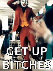 a picture of the joker with the words get up bitches above him
