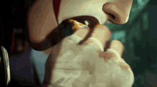 a close up of a person 's hand holding something