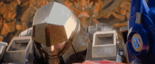 a close up of a robot 's head with the word transformers on it