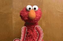Elmo Shrug GIF