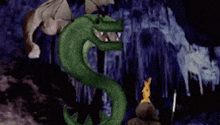 a green snake with a flame coming out of it 's mouth