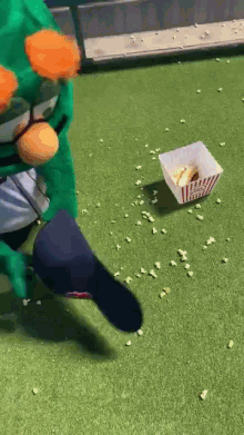 boston red sox wally the green monster mess popcorn cleaning up popcorn