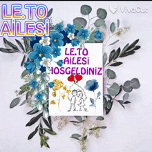 a card that says le to ailesi is surrounded by flowers and leaves