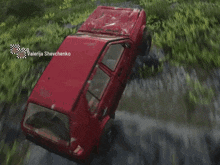 a red car in a video game with the name valerija shevchenko on the bottom