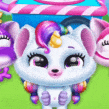 a cartoon unicorn with a rainbow mane and horn