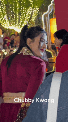 a woman in a red dress with the words chubby kwong on the bottom right
