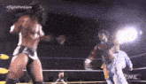 two men are wrestling in a ring with the words fight for liam on the bottom right