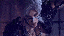 a man with white hair and a mask on his face says just a little more ..