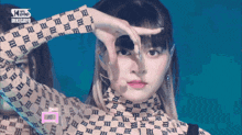 a girl wearing a turtleneck with letters on it