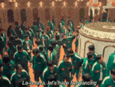 a large group of people are dancing in front of a merry go round and the words la-la-la-la let 's have fun