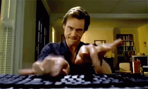 Jim Carrey typing fast.