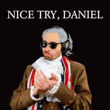 a man wearing a wig and sunglasses is clapping with the words nice try daniel below him