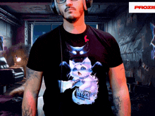 a man wearing a black t-shirt with a cat on it