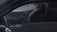 a man wearing a mask is talking on a phone