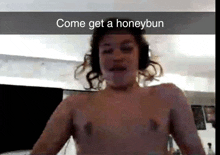 a shirtless man wearing headphones says come get a honeybun .