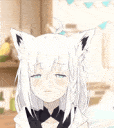 a girl with white hair and cat ears is making a face