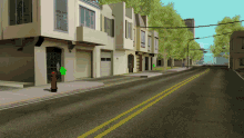 a fire hydrant sits on the sidewalk in front of a row of houses